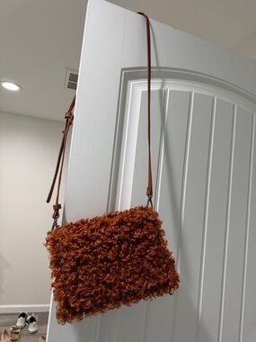 Steve Madden Curly Faux Shearling Crossbody in Rust Orange